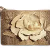 A clutch bag made from fish skin, decorated with a large flower created with collaged shapes cut from fish leather.