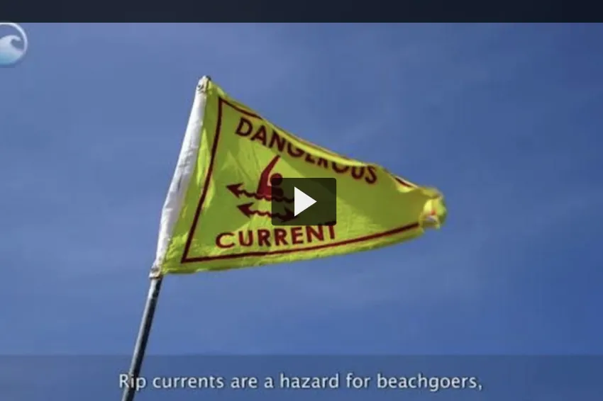A yello rip current warning flag.