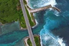 An aerial view of a roadway on an island