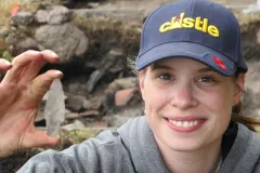 A researcher holds a maritime archaic point made of ramah chert that was found at Hare Harbor in Quebec, Canada in 2011