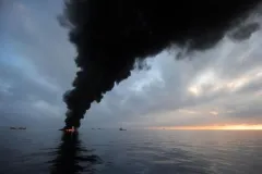 Oil burns during a controlled fire May 6, 2010 in the Gulf of Mexico.