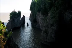 The Bay of Fundy in Nova Scotia, Canada has the highest tidal range. The tides range from 3.5m (11ft) to 16m (53ft) and cause erosion to the landscape, creating massive cliffs. 