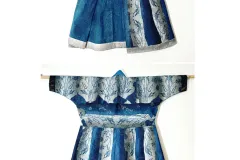 A blue, silver, and black fish skin robe displayed hanging from a rod. The robe is created from multiple fish skin sewn together and dyed with indigo.