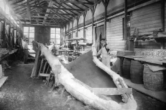 Workers in a shed preparing the cast of the blue whale