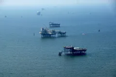 An aerial shot of oil rigs off the Louisiana coast.  