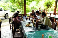 Smithsonian researchers eat a meal in preparation for a fossil excavation