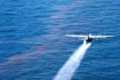 A C-130 Hercules from the Air Force Reserve Command deploys dispersant into the Gulf of Mexico May 5, 2010, as part of the Deepwater Horizon/BP oil spill response effort. 