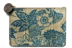 A clutch bag made from fish skin and decorated with blue floral patterns.