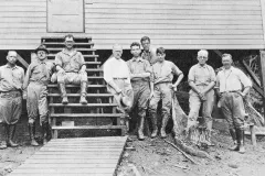 Men standing in front of a building 