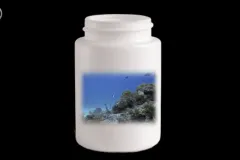 a medicine bottle with an image of the ocean