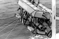 a robotic sensor hung over the water