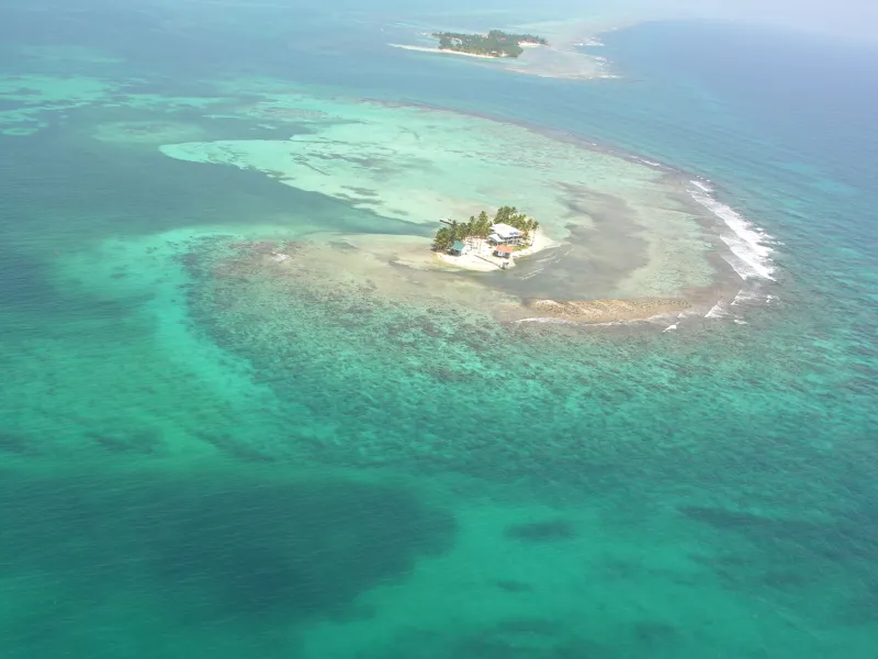 Carrie Bow Cay field station sits in the blue and turquoise waters of Belize.