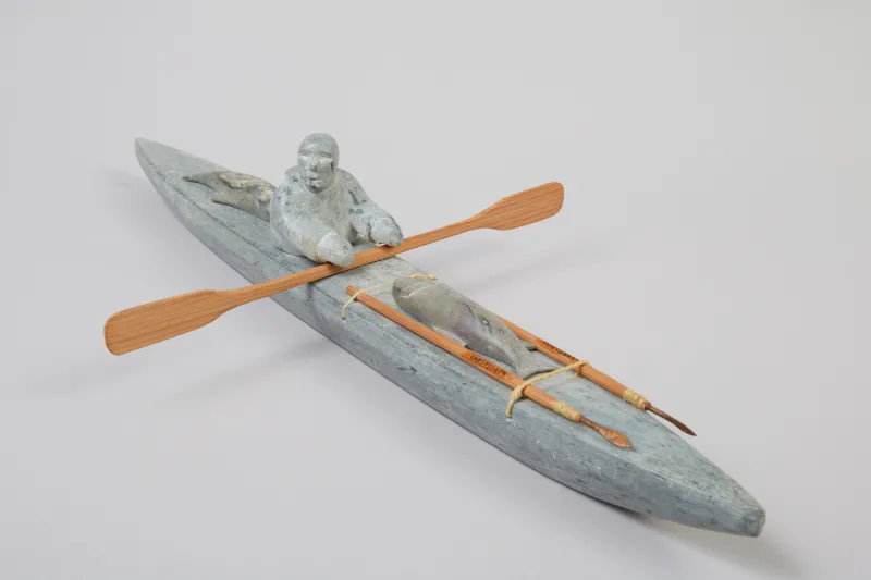 a sculpture os a kayaker