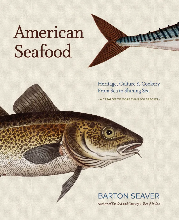 The Book Cover of American Seafood with a picture of a cod and tail of another fish.