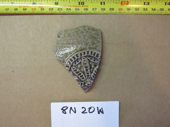 A fragment of European ballamine ceramic that was excavated at Hare Harbor in Quebec, Canada in 2011